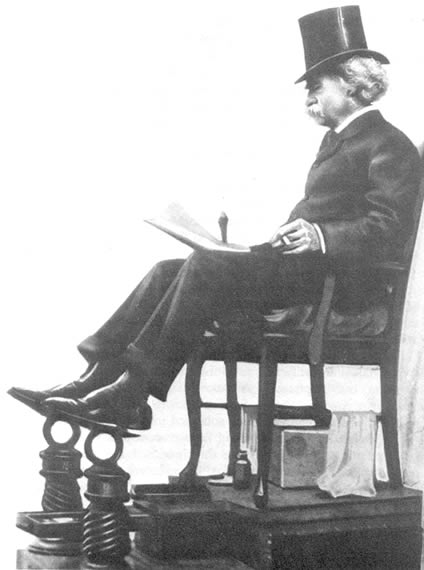 Twain in shoeshine chair